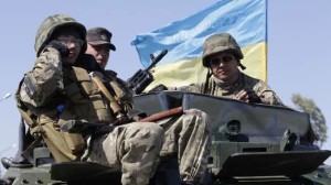 Soldiers of Ukrainian self-defence battalion "Azov" guard their position at a checkpoint in the southern coastal town of Mariupol